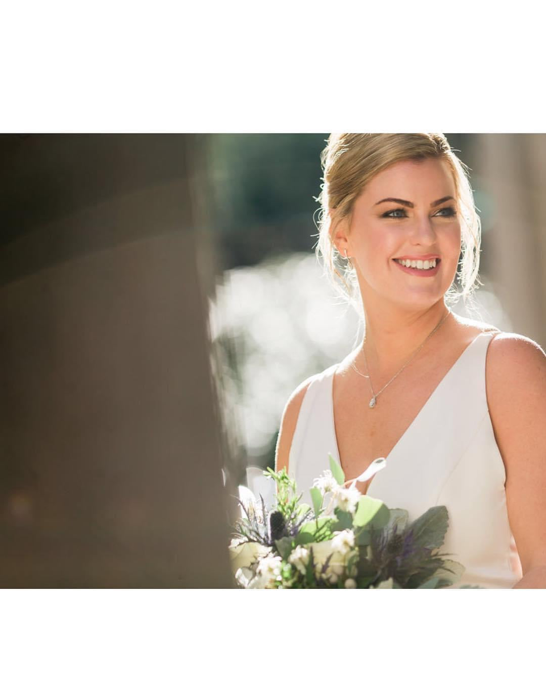 Candid fresh bridal beauty with natural bouquet