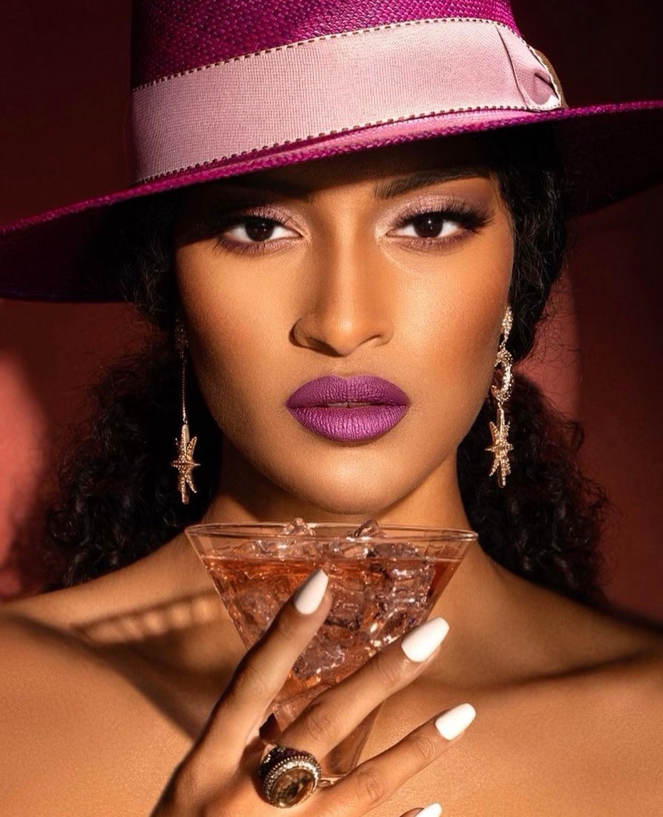 Bold purple lip commercial beauty with inclusive styling